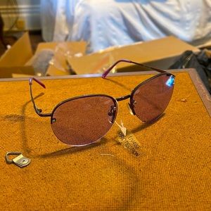 SUNGLASSES BLUISH/PURPLISH FRAMEV& LENS ROUNDED EDGES